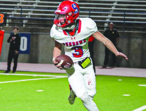 QB SWEEP - Sundown Roughneck Coen Nevarez navigated through traffic this past Thursday on the road in Odessa during the team’s playoff game against Wink. (Staff photo by Aalijah Soliz)