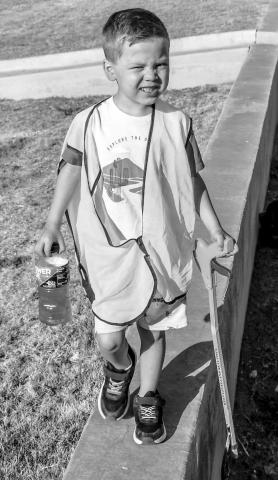 Randy Savage Blakley volunteered his time Saturday morning to take part in the Keep Levelland Beautiful Community Wide Clean-Up Event held along Highway 114. Blakley and his family were a part of the 90-plus volunteers taking part in the event. (Staff photo by Essence Childres)