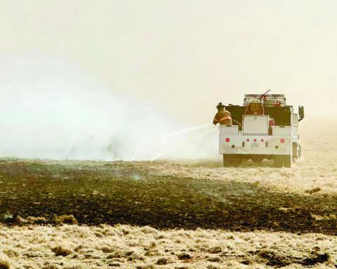 BATTLING FIRE CONDITONS - The Levelland Fire Department responded to several grass fire calls on Tuesday. A large portion of the region was placed under a rangeland fire warning which spanned the weekend and ended Tuesday evening. (Photo courtesy of LFD)