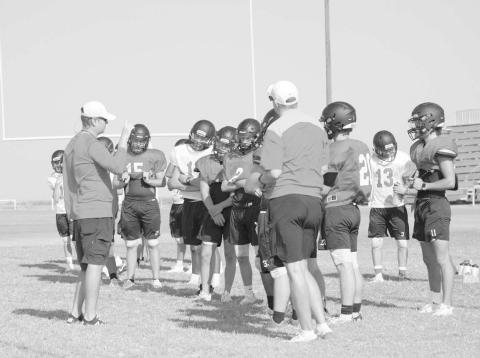 TEAM HUDDLE - The Whitharral Panthers had a team meeting to go over what the coaches expect and what to do in the next drill during two-a-day pracitces. (Staff photo by Aalijah Soliz)