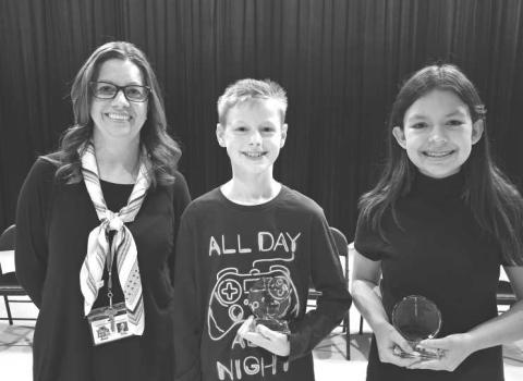 DISTRICT SPELLING BEE- LMS 5th-Grader Caleb Willey won the Levelland District Bee by spelling the word “composition”. The Bee included students from Capitol and South as well. The Bee went for 10 rounds. The Runner-Up was LMS 6th-Grader Katherine Bunker. Willey will continue on his spelling journey and compete in the Regional Bee in Lubbock in March. Pictured are: LMS Bee Coach Mixie Clowe with Caleb Willey and Katherine Bunker. (Photo submitted by Cristal Isaack)