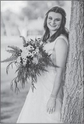Mr. & Mrs. Christian Lujan exchange wedding vows ..nee Elizabeth Greenhaw..