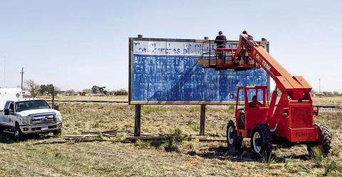 WELCOME TO LEVELLAND - The Levelland Chamber of Commerce has announced they are refurbishing a 40-year-old billboard located W. Highway 114. Pictured is an L&amp;L Construction crew beginning their work on the billboard this past week. (Photo courtesy of the Levelland Chamber)
