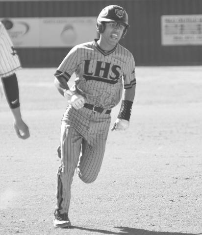 FULL SPEED - Levelland Lobo Noah Tienda ran full speed during the teams Linedrive Classic Tournament last week. The Lobos will face-off against Denver City Monday as the home team at 12 p.m. (Staff photo by Dom Puente)