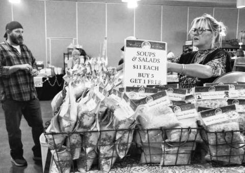 Michelle Kizzek was seen doing her booth for her company Violas Vittles at the Petticoats on the Prairie event held on Friday and Saturday at the Mallet Event and Arena. (Staff photo by Hannah Woodrum)