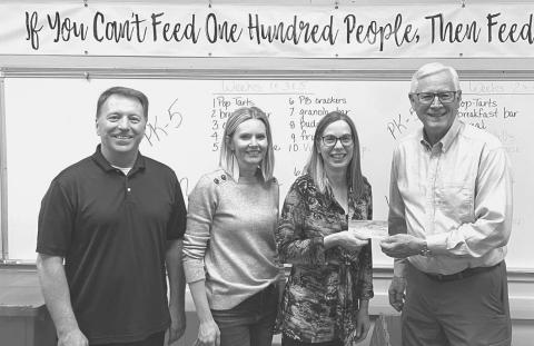 BREAKFAST ROTARY DONATION TO BILL’S BACKPACK