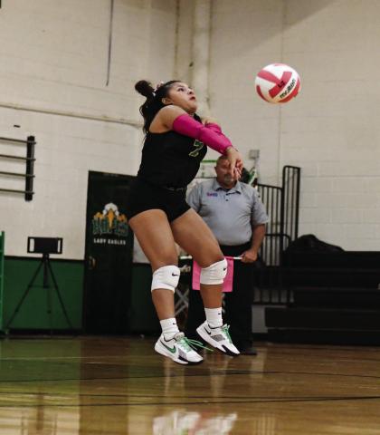 GET UP FOR IT - Marlee Molina jumps to make a play for Ropes varsity volleyball during a district match against Olton this past Tuesday. The Lady Eagles would go on to win 3-1. (Staff photo by Jentezen Smith)