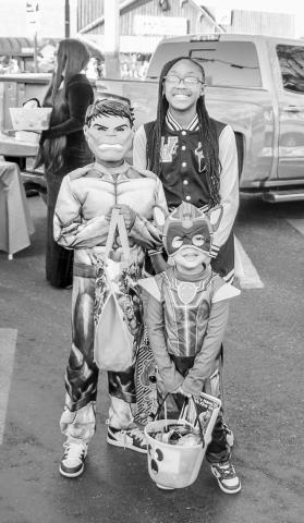 FAMILY TIME- Siblings Amaya and Amaje Mooring were Trunk or Treating with their cousin Jasper Gonzalez on Halloween this past Thursday on the square. They were having a great time and stopped for a quick photo before returning to the fun.(staff photo by Essence Childers)