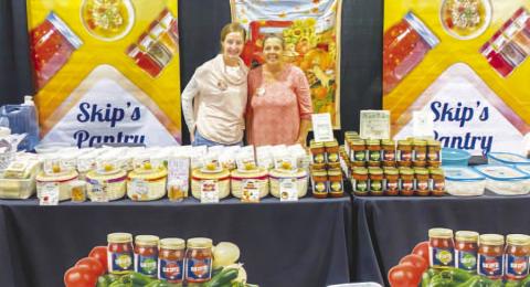 SKIP’S SALSA - Petticoats on the Prairie has become an anticipated event for surrounding community members as the vintage market draws numerous vendors. The event was held at the Mallet Event Center and Arena this past Friday and Saturday. Skip’s Salsa was a vendor at the event and pictured is Tami Potts and Angela Montiel. (Staff photo by Myra Guerrero)