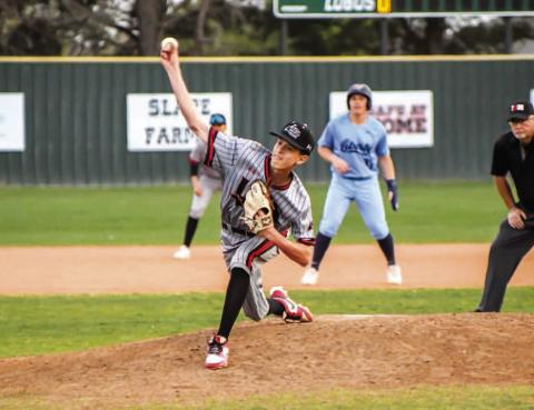 RELIEF EFFORT - Lobo Kane Rice pitched five and a third innings in relief during Tuesday’s district game at home against the Liberty Patriots. In the outing, Rice would allow two runs on five hits and three walks. The pitcher would also record two strikeouts. The Lobos would drop the district home game, 11-10. (Staff photo by Dom Puente)