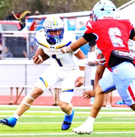 Whiteface Antelope Luke Gresham hunts for a hole as the New Deal defense bears down. (WCISD photo)