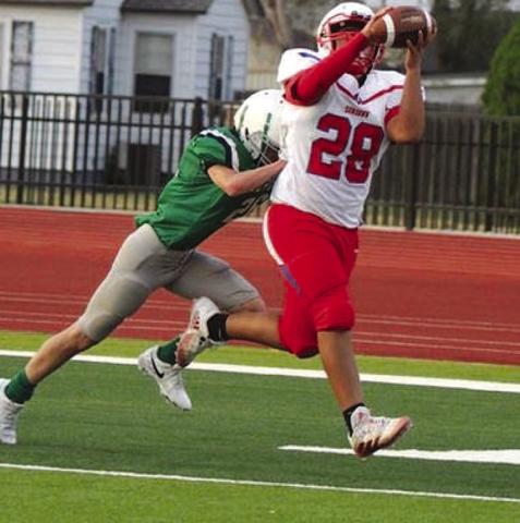 TOUCHDOWNGRAB- Sundown eighth grader, Andrew Rodriguez caught a dime thrown by Isaiah Igo to complete a Roughneck touchdown as the eighth graders battled Floydada to a 42-8 win. (Photo Courtesy of Sundown ISD)