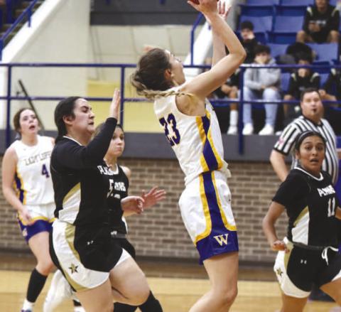 EASY TWO- The Lady Antelopes won the Way Out West Basketball Tournament in Whiteface over the weekend. Allison Martha put in an easy two points on a lay-up. (Photo Courtesy of Holly Crutcher)