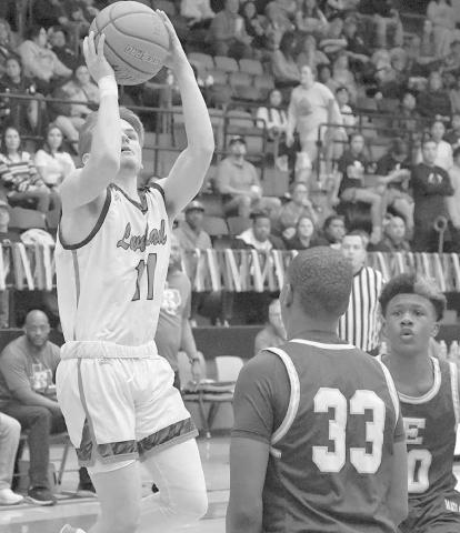 TOP SCORER-Levelland Lobos found themselves back in the win column after a competitive home stand against the Estacado Matadors, 58-52, Friday night. Carson Boggs led all Lobos in scoring with 14 points. (Staff Photo by Dom Puente)