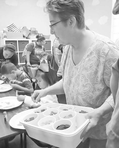 VOLUNTEER -The Hockley County Library hosted “Doodles and Donuts” this past week for the summer reading program. Many volunteers have showed up to help throught the summer. (Staff Photo by Aalijah Soliz)