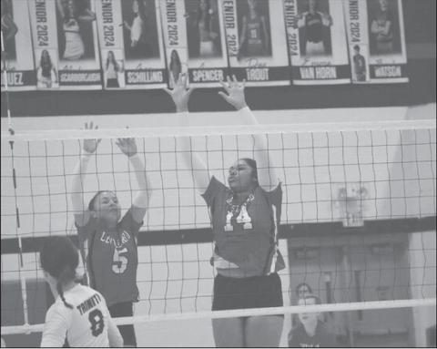EFFORT - Levelland athletes Tanaesia Brackens and Allison Monge made the block on the defensive side of the ball. The Loboettes started district play this Saturday against a decent Sweetwateer team as the away team. (Staff photo by Aalijah Soliz)