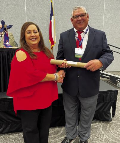BIG HONOR - Hockley County Judge Sharla Baldridge accepted her Commissioners Court Advanced Curriculum Certificate of Achievement from Swisher County Judge Harold Keeter, 2022-23 president of the County Judges and Commissioners Association of Texas. (Submitted Photo)