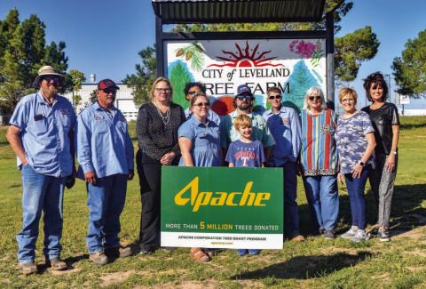 COMMUNITY TREE GIVEAWAY - It was a busy Wednesday for the volunteers handing out trees to the Levelland community Wednesday afternoon thanks to the Apache Tree Grant that Keep Levelland Beautiful received. Community members lined up along side the Levelland Civic Center to receive two free trees to plant themselves. Pictured from left to right are: Steve Golden, Juan Galvan, Kelly Hancock, Adrian Mellberg, Robert Pegues, Dustin and Atikas Reichelt, Shanna Davis, Donna Wheeler, Barbra Pinner and Cristal Issa