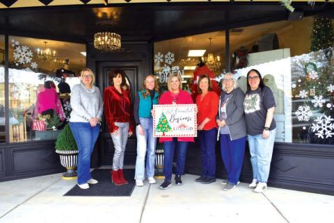 BUSINESS WINNER - The Owner Of Studio- K was selected as the winner of Keep Levelland Beautiful annual Best Decorated Business of the month contest for the 2023 holiday season. Pictured from left to right Kelly Hancock, Cristal Issacks, Chole Carpenter, Kenna Trotter owner, Tammy Franklin, Donna Wheeler and Janie Morales. Awards were presented the week before Christmas.(Staff photo by Emily Campos)