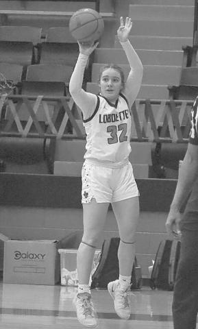 THREE - Levelland Loboette Emery Smith shot the ball during the teams game against the Lakeview Maidens this past Tuesday as the team became district champs for the fourth year in a row. (Staff photo by Aalijah Soliz)
