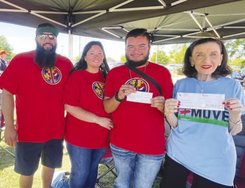 AUTISM AWARENESS - A check was presented for $900 from Levelland ABC as well as a personal check on behalf of the Lopez Family. Pictured is Jeremy Lopez, Jeanette Lopez and Zeth Lopez. They presented the check to Jere Lynn Burkhart at the Texas Tech Burkhart Center walk for Autism Awareness on April 28. Zeth Lopez is currently a senior at Levelland High School, he has applied and is looking forward to attending the Transition Academy at Texas Tech. (Photo courtesy of Jeanette Lopez)