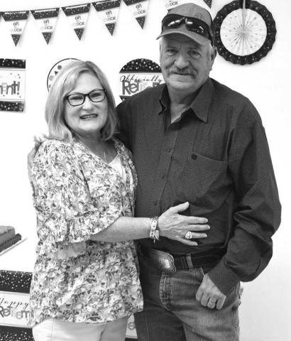 RETIRING- After 18 1/2 years, Bruce Heflin is retiring as Utilities Director for the City of Whiteface. Heflin and his wife Alicia are pictured at a retirement reception at the Whiteface Community Center on April 30. Whiteface Mayor James Soliz thanked Heflin for his years of service, saying, “We’re going to miss him.” Heflin isn’t leaving public service, though. He will remain as chief of the Whiteface Volunteer Fire Department. (Photo by Jay Kelley)