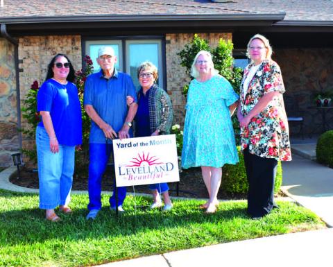 JULY YARD OF THE MONTH - The Yard of the Month for July was given to Billy and Libby Thetford at 517 Jackson, on Tuesday. The monthly contest is held by the Chamber of Commerce and Keep Levelland Beautiful Program.Pictured from left to right is: Janie Morales, Billy and Libby Thetford, Donna Wheller and Kelly Hancock. (Photo courtesy of Emily Campos)