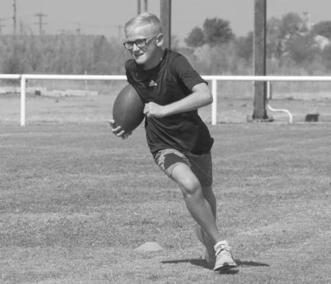 TURNING THE CORNER - Whitharral Panther Preston Prowell turned the edge on the cone this past Monday at the Whitharral Football Field during the Whitharral All-Sports Camp. (Staff photo by Aalijah Soliz)