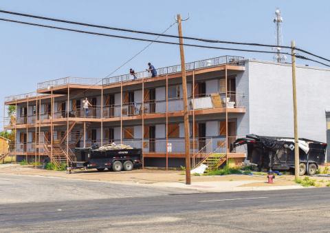 TEAR DOWN - A construction crew has been spending the week doing demolition for what was the Legacy Apartments.