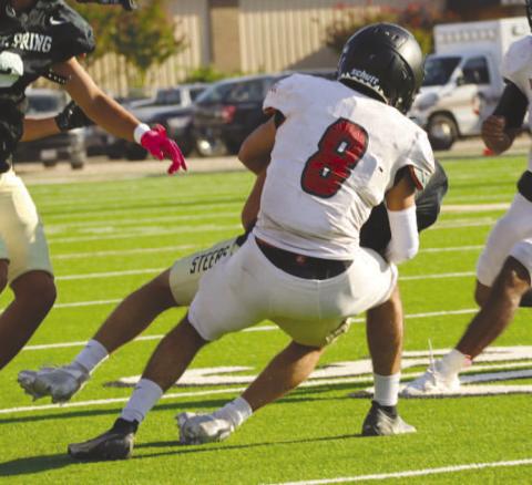 SECURE TACKLE - Levelland Lobo Zaden Carrillo made the wrap up tackle at the line of scrimmage this past Thursday on the road in Big Spring against the Steers. The Levelland Lobos will host the Dalhart Wolves this Friday for their first game of the season. (Staff photo by Aalijah Soliz)
