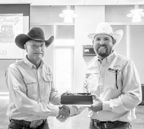 AG PROFESSIONAL OF THE YEAR - Levelland’s Chamber of Commerce Ag Committee hosted the annual Hockley County Agricultural Appreciation Event on Wednesday at the Mallet Center. Each year, the Ag Committee recognizes an individual who has made a lasting contribution to the agricultural industry. The 2024 Agricultural Professional of the Year was introduced by Paxton Pugh with the award being presented to Cole Garner. (Staff photo by Evin Thomas)