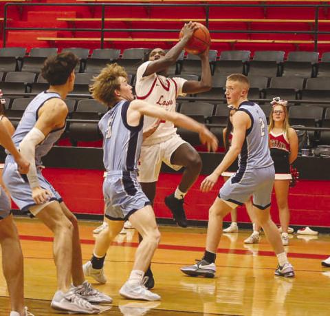 ATHLETIC FINISH - Levelland Lobo Elijah Jordan layed the ball up through contact in the team’s game against the Greenwood Rangers this past Tuesday at home. (Staff photo by Aalijah Soliz)