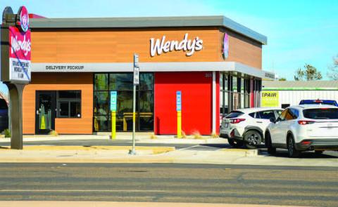 GRAND OPENING RUSH - Wendy’s located at 301 College Avenue officially opened Monday at 11 a.m. With the heavy amount of traffic entering and leaving the restaurant, community members are encouraged to be vigilant of possible vehicles in the right lane of College Avenue waiting to enter the parking lot. (Staff photo by Dom Puente)