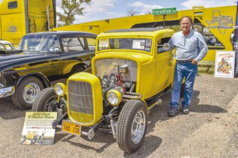 STAR OF THE SHOW – Pictured is Nicholas Olenik showing off a 1932 Ford B owned by Rich Puryear. The car is part of a collection of vehicles from the film American Graffiti, which were featured in the Thunder On the Plains Car Show on Saturday at the Levelland City Park. Puryear also won third in the Non- Fendered Class. (Staff photo by Ada Niederhauser)