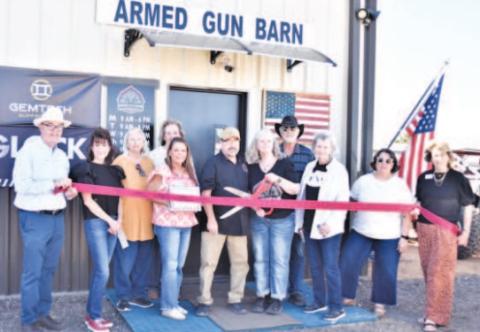 ARMED GUN BARN RIBBON CUTTING