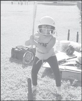AT THE READY- Isabella Castillo was getting ready to swing at the ball and get her fundamentals down. (Staff Photo by Aalijah Soliz)
