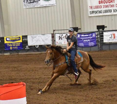 BARREL RACE- Lesley Casper #32 participated in The Betty’s Barrel Race on Saturday at the Mallet Event Center where over 300 participants competed from all over the country. Casper traveled to Levelland all the way from Miami, Florida, where Lesley races all over in the circuit of barrel racing. (Staff photo by Emily Campos)