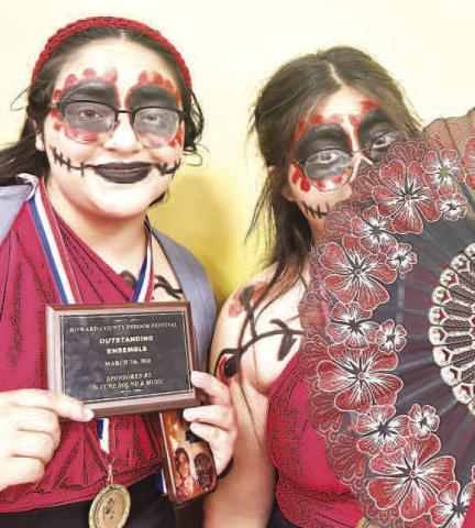 LHS ENSEMBLE OUTSTANDING ENSEMBLE-- Levelland HS Allegro Winterguard Breanna Garza and Rosa Servin earned Division 1 ratings for their ensemble and were also awarded Outstanding Ensemble of the Day at the Howard County Indoor Festival.(Levelland ISD photo)