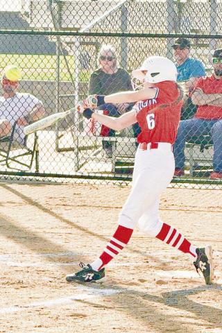 HITTING MACHINE - Sundown Roughette Emry Jourden puts a swing on the softball during their game against the New Home Lady Leopards this past Tuesday night. (Photo provided by Sundown ISD)