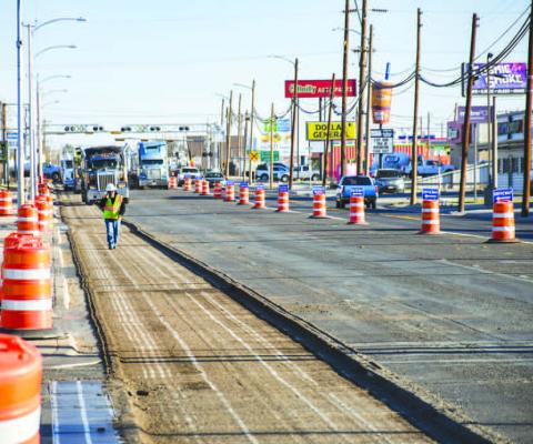 DRIVE WITH CAUTION - TxDOT has began milling the south bound lanes of College Avenue between McDonald’s (College Avenue and Houston) and N. Highway 114. With multiple traffic lights turned into four-way stops and traffic being pushed to the north bound lanes of College Avenue, community members and commuters are asked to be vigilant while traveling through the area. Pictured are semi’s preparing to be filled with milled asphalt. (Staff photo by Dom Puente)