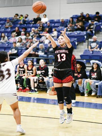 MIDDY MAGICIAN - Whitharral Lady Panther Aaliyah Sanchez shoots a mid-range baseline jumper and nails it during their playoff game against Sands this past Monday night at Tahoka High School. (Staff photo by Jentezen Smith)