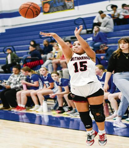 THREE-POINT THREAT - Whitharral Lady Panther Aerieana Rodriguez pulls up from three point range during their basketball game against the Lubbock Titans in the Caprock Classic this past Tuesday at Estacado High School. (Staff photo by Jentezen Smith)