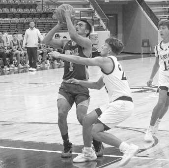 MID-RANGE SHOT - Whiteface Antelope Auscar Gandara pulled up from mid-range to earn the Antelopes some needed points in the team’s game against the Farwell Steers. The Antelopes next game of the season is against the Plains Cowboys on the road at 7:30 p.m. for their district matchup. Plains is sitting in second place in district with a 16-2 overall record and a 1-0 record, behind the Ropes Eagles who are undefeeated in district play with a 2-0 record beating Morton and Whiteface.(Staff photo by Aalijah Soli