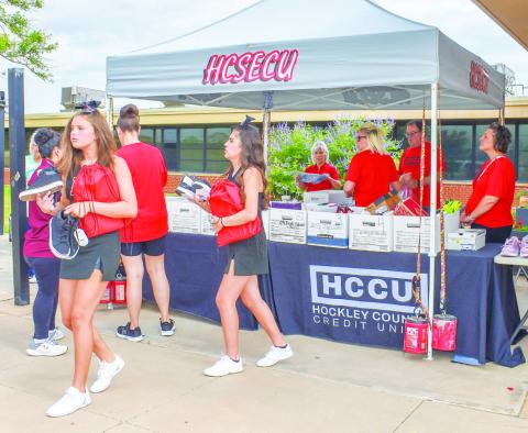 SHOE GIVEAWAY- The Hockley County Credit Union and Renegade organized a Shoe Drive for students. The shoes were disributed to local students that also recivied a Back-to-School Backpack at The Hockley County Voices Colalition Backpack Giveaway on Saturday at Capitol Elementary. The event assists students with back to school shoes and school supplies. (Photo courtesy of Emily Campos)