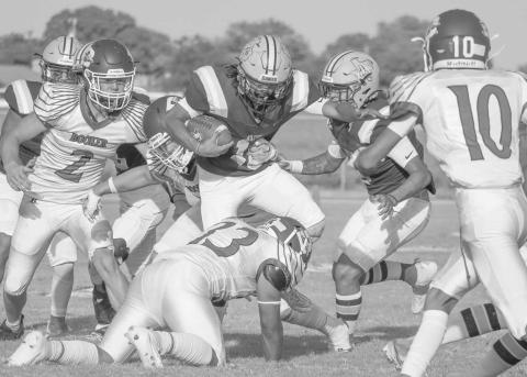 TOUGH RUN - Anton running back Gavin Martinez ran through the Booker defense to pick up some hard earned yards in their loss with a score of, 38-12. Anton’s next game is against White Deer as the away team at 7:00 p.m, to continue their season. (Staff photo by Aalijah Soliz)