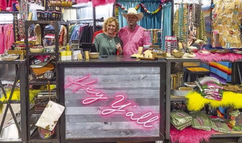 FARM GIRL FROSTING - Venders throughout the state attended the annual Petticoats on the Prairie event on Friday and Saturday. Traveling all the way from Claude, Tx, Tessa and Scott Waddell brought their booth to the Mallet Event Center and Arena. (Staff photo by Myra Guerrero)