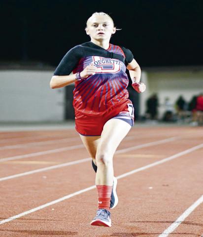 DOUBLE CHAMP - Sundown’s Kaytlin Clausen paces herself during a race this past Friday at the District Championships at Sundown High School. Clausen would be the District Champion in the 1,600 and 3,200. (Staff photo by Jentezen Smith)