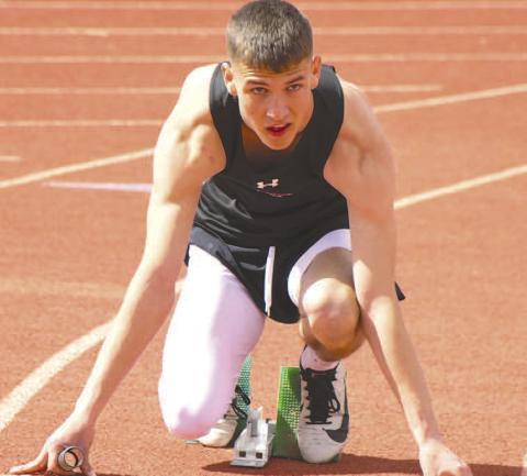 STARTING BLOCK- Levelland hosted their annual track meet last week at Levelland Middle School. Lobo sprinter Ben Alvarado took his mark in the starting blocks during the meet. (Photo Courtesy of Dom Puente)