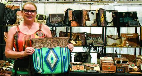 HOMEMADE BAGS - There was so many unique treasures at the Petticoats on the Prairie at the Mallet Event Center and Arean on Friday and Saturday, starting with this gorgeous western bag. (Staff photo by Hannah Woodrum)