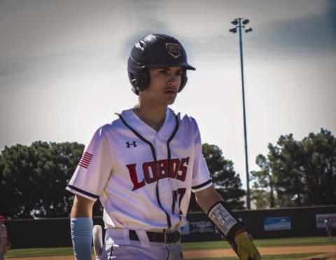 GAME TIME - Levelland Lobo Rance Massey headed over to the dugout during the team’s home game against the Denver Ciety Mustangs this past Tuesday. (Staff photo by Aalijah Soliz)